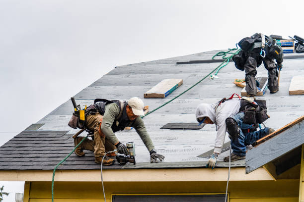 Professional Roofing technician working in Stringtown, OK